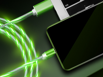 Green light-up charging cable connected to a phone
